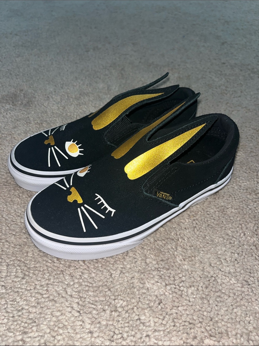 Vans Kids Black Slip-On Sneakers with Gold Cat Ears & Face